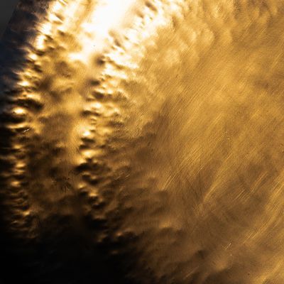 A metal gold gong